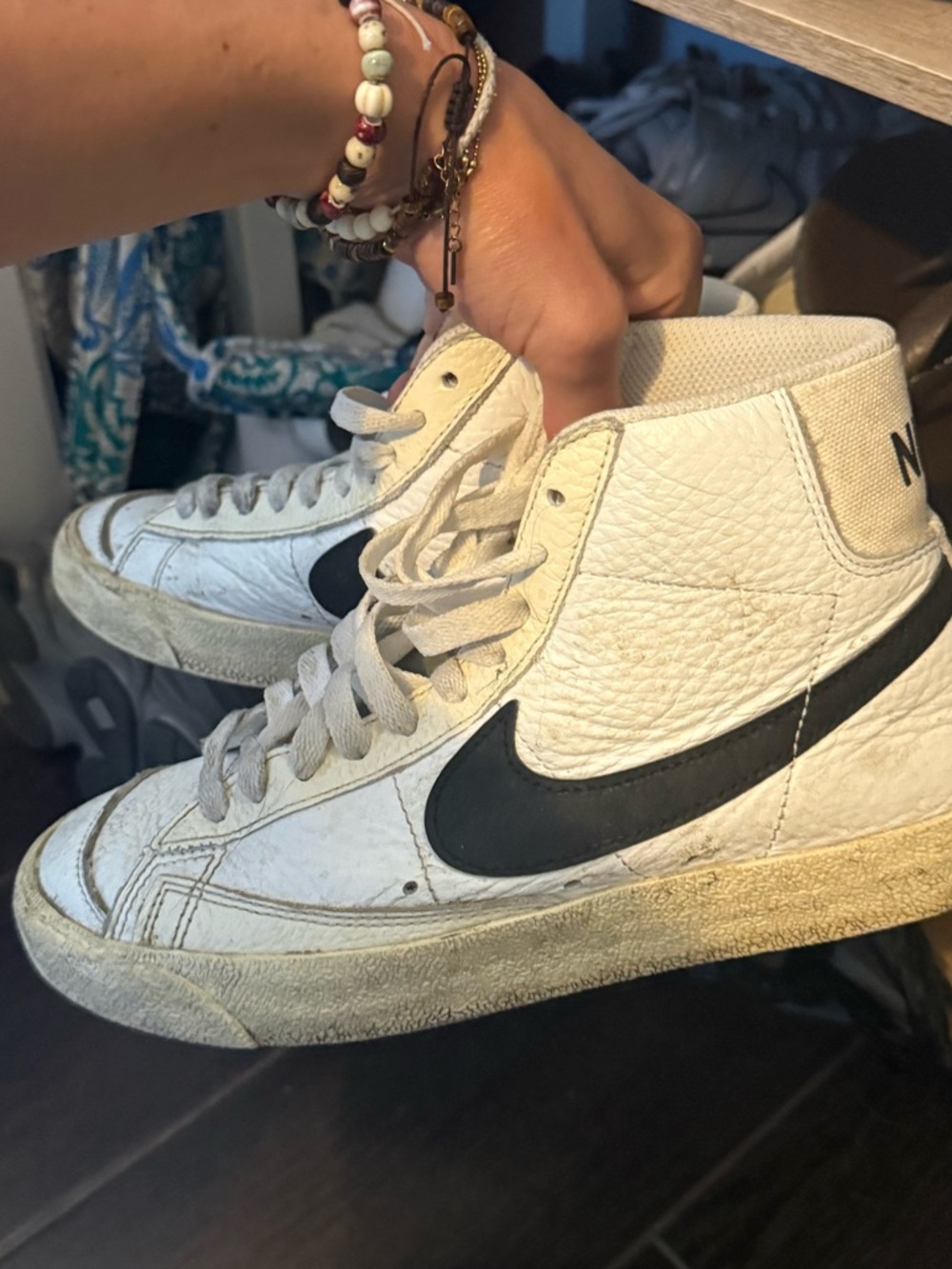 Nike White High-Top Sneakers with Black Swoosh
